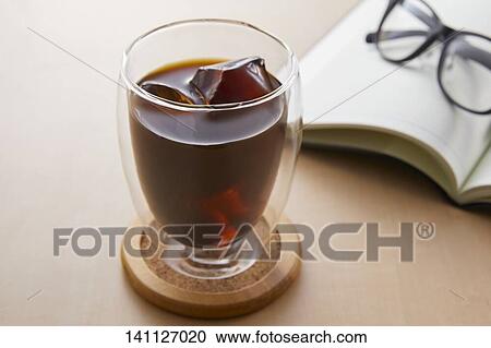 Glass Of Coffee On The Desk View Large Photo Image Stock Image - Glass Of Coffee On The Desk. Fotosearch