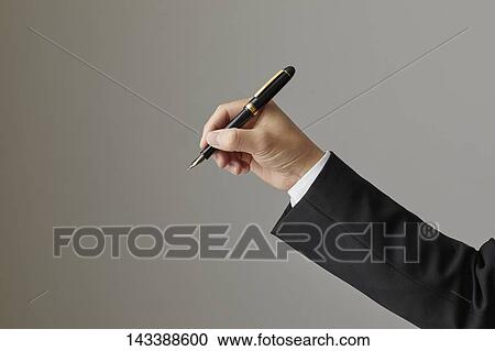 Hand holding pen View Large Photo Image Stock Image - Hand holding pen. Fotosearch