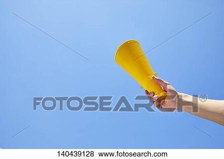 Stock Photo - Hand With A Megaphone. Fotosearch