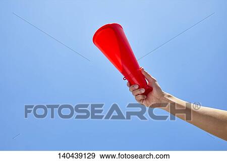 Stock Photo - Hand With A Megaphone. Fotosearch