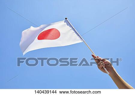 Picture - Hand With Japanese Flag. Fotosearch