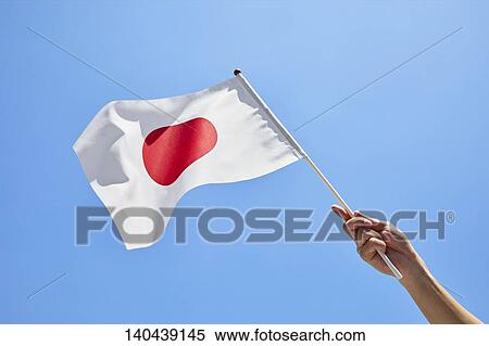 Stock Photography - Hand With Japanese Flag. Fotosearch