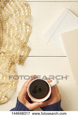 Hands holding cup of coffee View Large Photo Image Stock Photo - Hands holding cup of coffee. Fotosearch