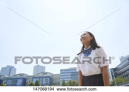 Happy Japanese junior high schoolgirl View Large Photo Image Picture - Happy Japanese junior high schoolgirl. Fotosearch