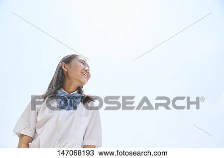 Happy Japanese junior high schoolgirl View Large Photo Image Stock Image - Happy Japanese junior high schoolgirl. Fotosearch