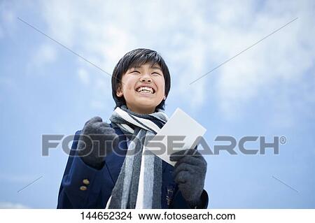 Happy Japanese teenager outdoors View Large Photo Image Picture - Happy Japanese teenager outdoors. Fotosearch