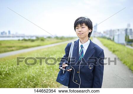 Happy Japanese teenager outdoors View Large Photo Image Picture - Happy Japanese teenager outdoors. Fotosearch