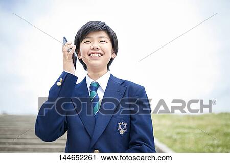 Happy Japanese teenager outdoors View Large Photo Image Stock Image - Happy Japanese teenager outdoors. Fotosearch