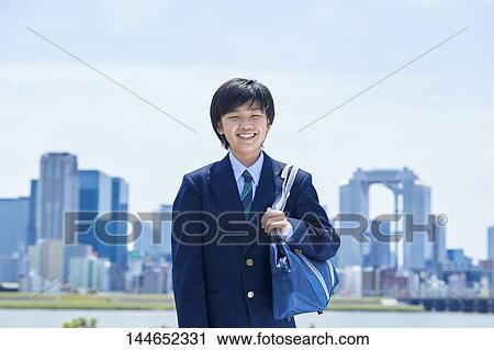 Happy Japanese teenager outdoors View Large Photo Image Stock Image - Happy Japanese teenager outdoors. Fotosearch