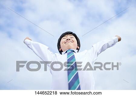Happy Japanese teenager outdoors View Large Photo Image Stock Photo - Happy Japanese teenager outdoors. Fotosearch