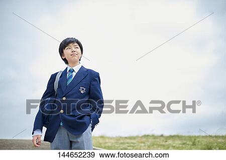 Happy Japanese teenager outdoors View Large Photo Image Stock Photo - Happy Japanese teenager outdoors. Fotosearch