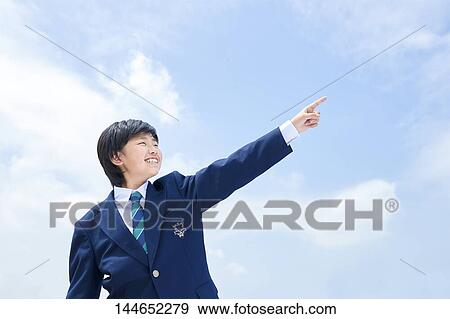 Happy Japanese teenager outdoors View Large Photo Image Stock Photo - Happy Japanese teenager outdoors. Fotosearch