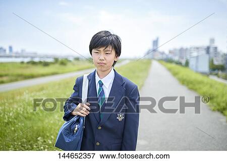 Happy Japanese teenager outdoors View Large Photo Image Stock Photo - Happy Japanese teenager outdoors. Fotosearch