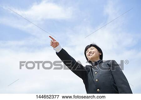 Happy Japanese teenager outdoors View Large Photo Image Stock Photo - Happy Japanese teenager outdoors. Fotosearch