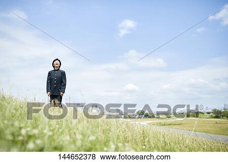 Happy Japanese teenager outdoors View Large Photo Image Stock Photo - Happy Japanese teenager outdoors. Fotosearch
