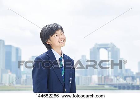 Happy Japanese teenager outdoors View Large Photo Image Stock Photograph - Happy Japanese teenager outdoors. Fotosearch