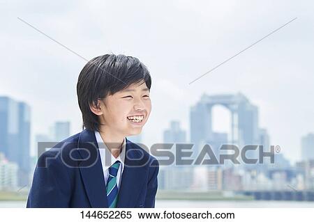Happy Japanese teenager outdoors View Large Photo Image Stock Photography - Happy Japanese teenager outdoors. Fotosearch