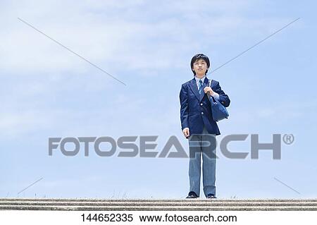 Happy Japanese teenager outdoors View Large Photo Image Stock Photography - Happy Japanese teenager outdoors. Fotosearch