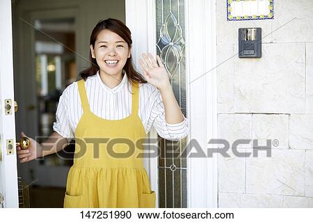 Happy Japanese woman at home View Large Photo Image Stock Image - Happy Japanese woman at home. Fotosearch