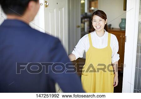 Happy Japanese woman at home View Large Photo Image Stock Image - Happy Japanese woman at home. Fotosearch