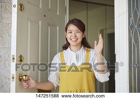 Happy Japanese woman at home View Large Photo Image Stock Photo - Happy Japanese woman at home. Fotosearch