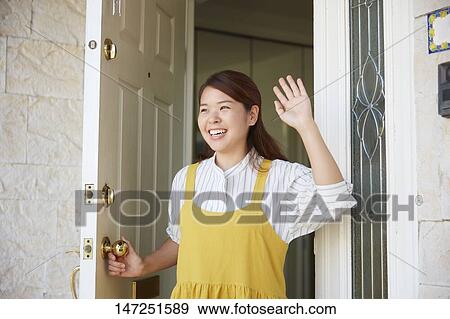 Happy Japanese woman at home View Large Photo Image Stock Photo - Happy Japanese woman at home. Fotosearch