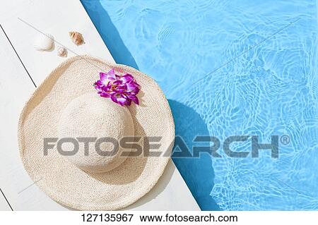 Hat At The Poolside View Large Photo Image Stock Photo - Hat At The Poolside. Fotosearch