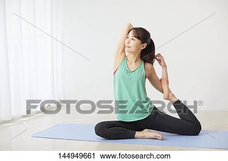Healthy Japanese woman training at home View Large Photo Image Stock Image - Healthy Japanese woman training at home. Fotosearch