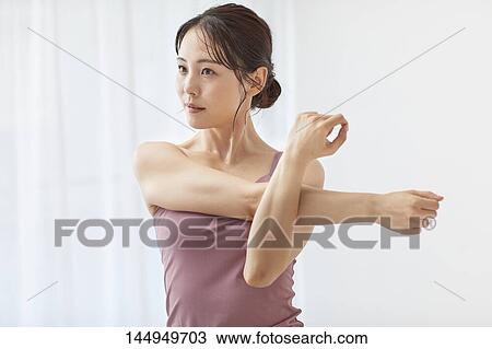Healthy Japanese woman training at home View Large Photo Image Stock Image - Healthy Japanese woman training at home. Fotosearch