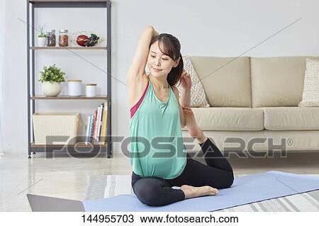 Healthy Japanese woman training at home View Large Photo Image Stock Image - Healthy Japanese woman training at home. Fotosearch