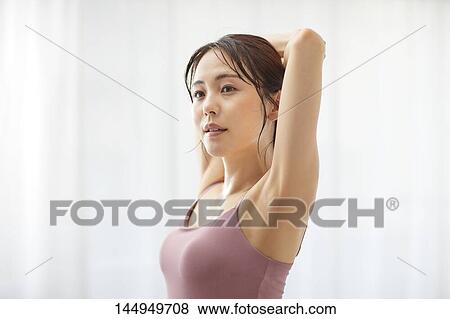 Healthy Japanese woman training at home View Large Photo Image Stock Photo - Healthy Japanese woman training at home. Fotosearch