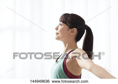 Healthy Japanese woman training at home View Large Photo Image Stock Photograph - Healthy Japanese woman training at home. Fotosearch