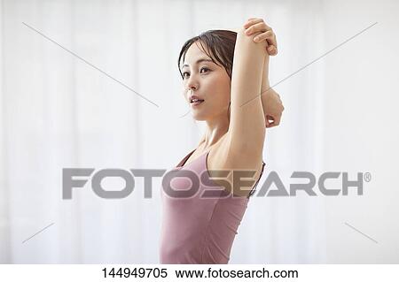 Healthy Japanese woman training at home View Large Photo Image Stock Photography - Healthy Japanese woman training at home. Fotosearch