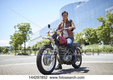 Stock Image - Japanese biker. Fotosearch