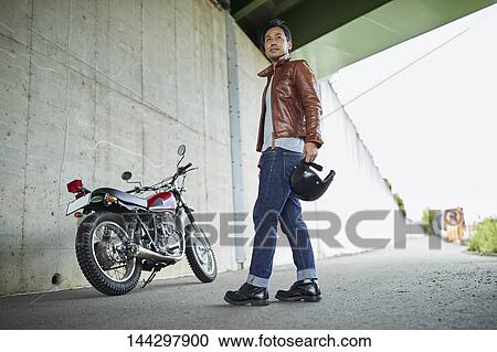 Stock Image - Japanese biker. Fotosearch