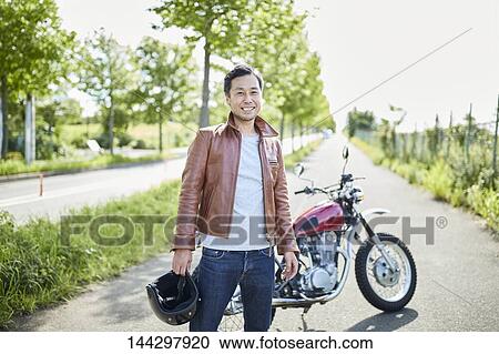 Stock Image - Japanese biker. Fotosearch