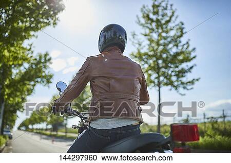 Stock Image - Japanese biker. Fotosearch