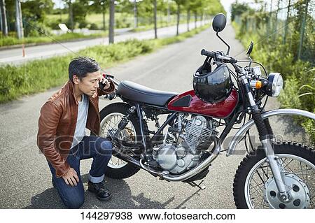 Japanese biker View Large Photo Image Stock Photo - Japanese biker. Fotosearch