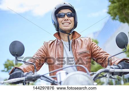 Stock Photograph - Japanese biker. Fotosearch