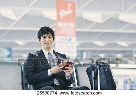 Japanese businessman at the airport View Large Photo Image Picture - Japanese businessman at the airport. Fotosearch