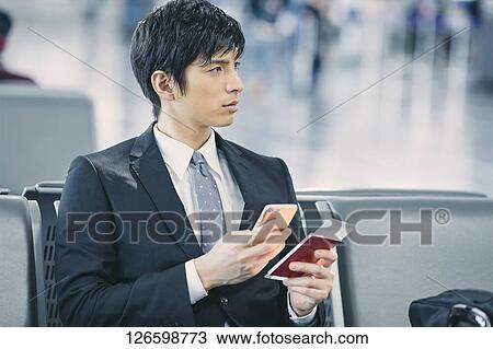Japanese businessman at the airport View Large Photo Image Stock Image - Japanese businessman at the airport. Fotosearch