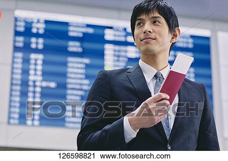 Japanese businessman at the airport View Large Photo Image Stock Image - Japanese businessman at the airport. Fotosearch