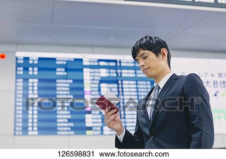 Japanese businessman at the airport View Large Photo Image Stock Image - Japanese businessman at the airport. Fotosearch