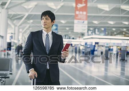 Japanese businessman at the airport View Large Photo Image Stock Photography - Japanese businessman at the airport. Fotosearch