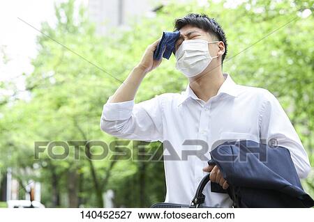 Japanese Businessman Wiping Off The Sweat With Handkerchief View Large Photo Image Stock Photo - Japanese Businessman Wiping Off The Sweat With Handkerchief. Fotosearch