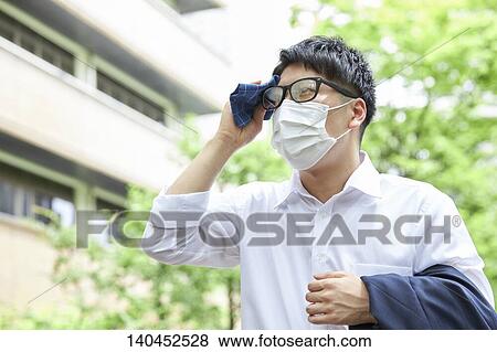Japanese Businessman Wiping Off The Sweat With Handkerchief View Large Photo Image Stock Photo - Japanese Businessman Wiping Off The Sweat With Handkerchief. Fotosearch