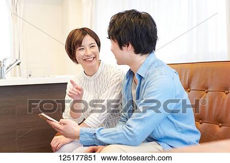Japanese couple at home View Large Photo Image Stock Image - Japanese couple at home. Fotosearch