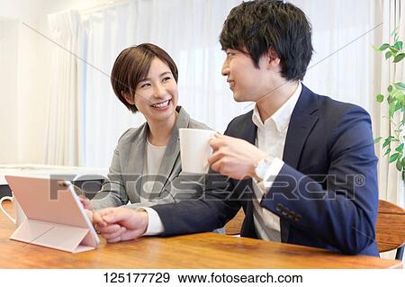 Japanese couple at home View Large Photo Image Stock Photo - Japanese couple at home. Fotosearch