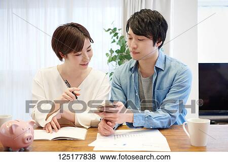 Japanese couple at home View Large Photo Image Stock Photo - Japanese couple at home. Fotosearch
