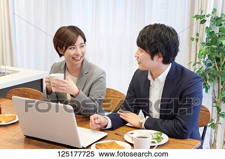 Stock Photography - Japanese couple at home. Fotosearch